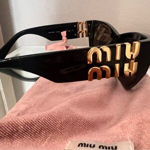 100 Authentic MIU MIU sunglasses